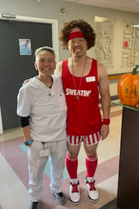 A pair of Asbury Park employees dressed up as athletes
