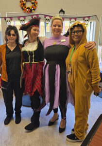 A group of employees dressed up at Asbury Park for Halloween