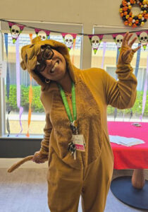 An employee at Asbury Park dressed up as a lion for Halloween
